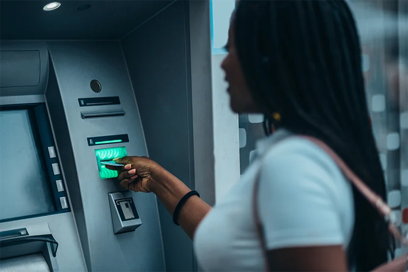 Woman using an ATM